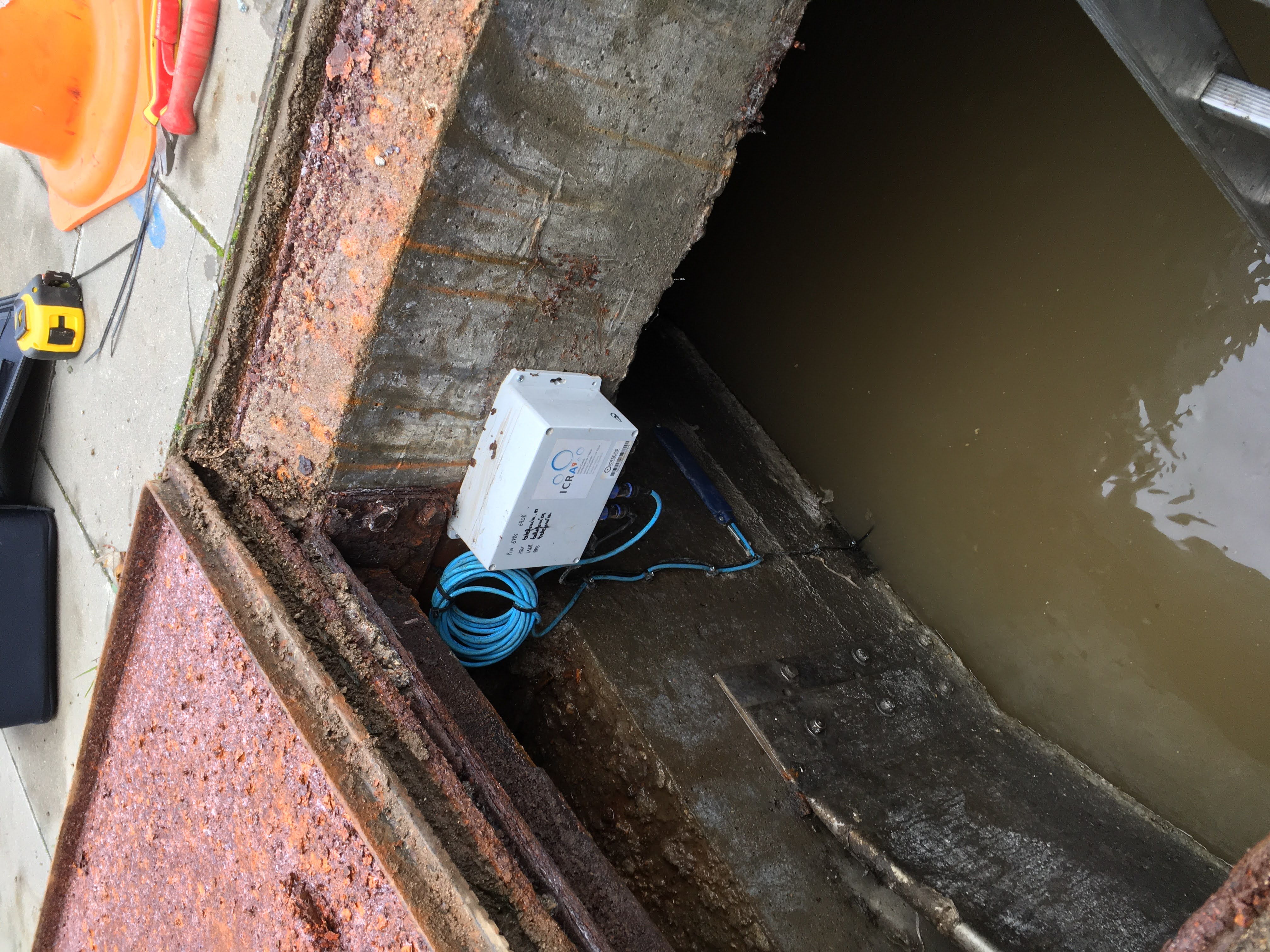 Diving into the low-cost sensors for real-time combined sewer overflows and flood monitoring